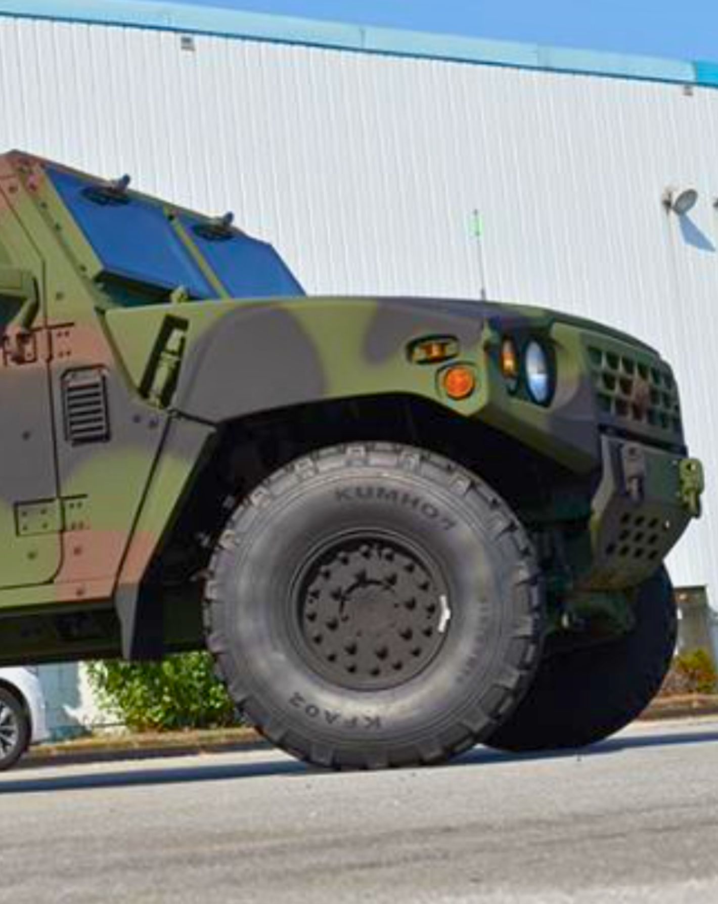 KLTV181 in woodland camouflage on rough ground