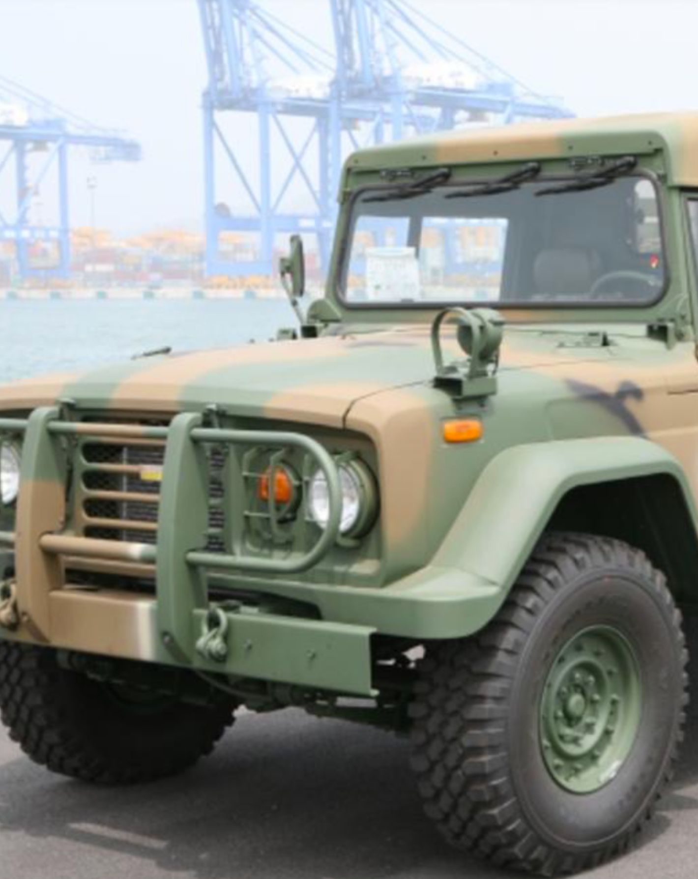 KM450 series cargo truck at a container port
